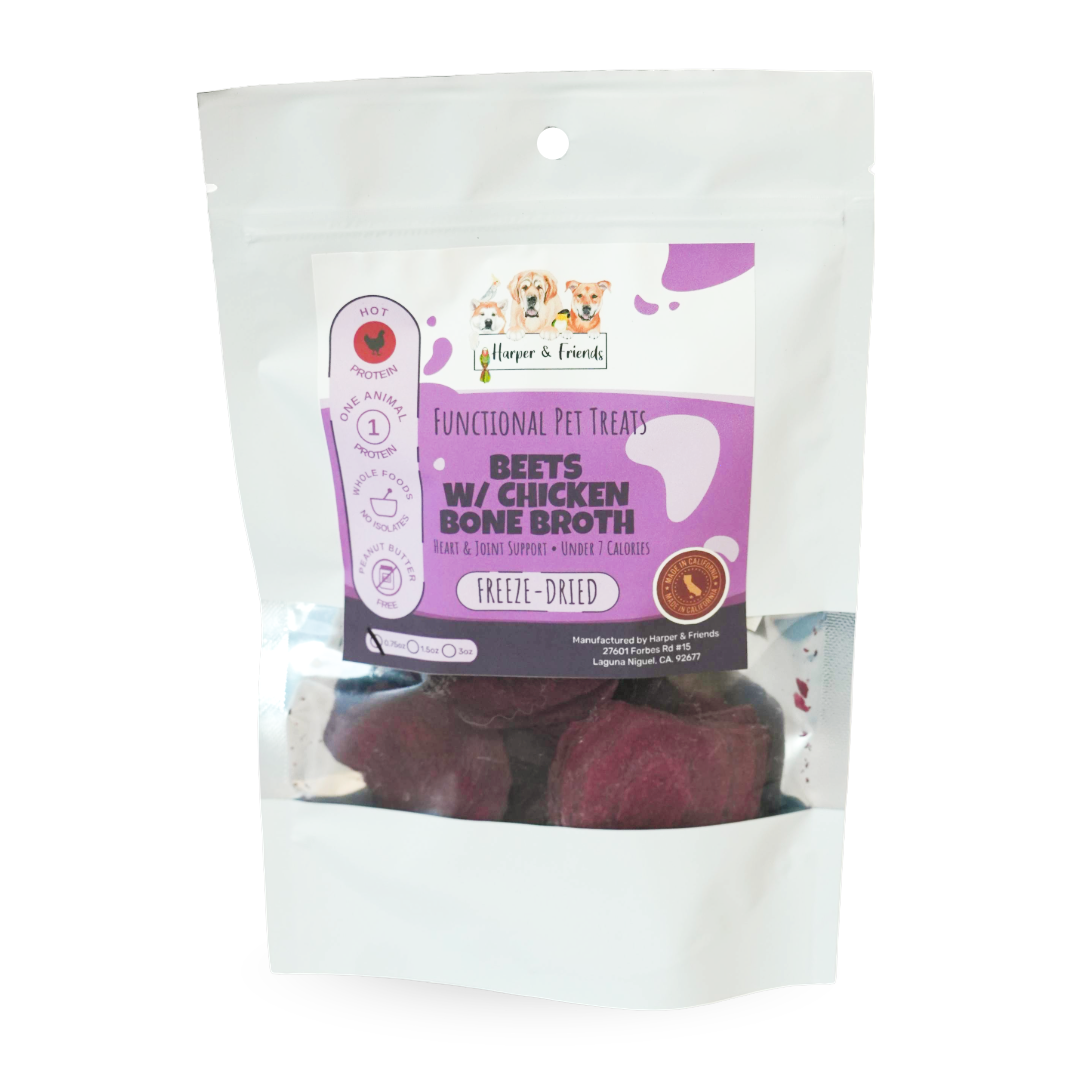 A stand-up pouch of 'functional pet treats' by 'Harper & Friends' featuring freeze-dried beets with chicken bone broth treats visible through a clear window at the bottom.