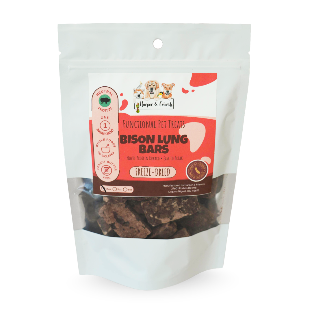 A stand-up pouch of Harper & Friends functional pet treats, specifically Bison Lung Bars, with a white and orange label showing the brand logo and product details, set against a plain white background.