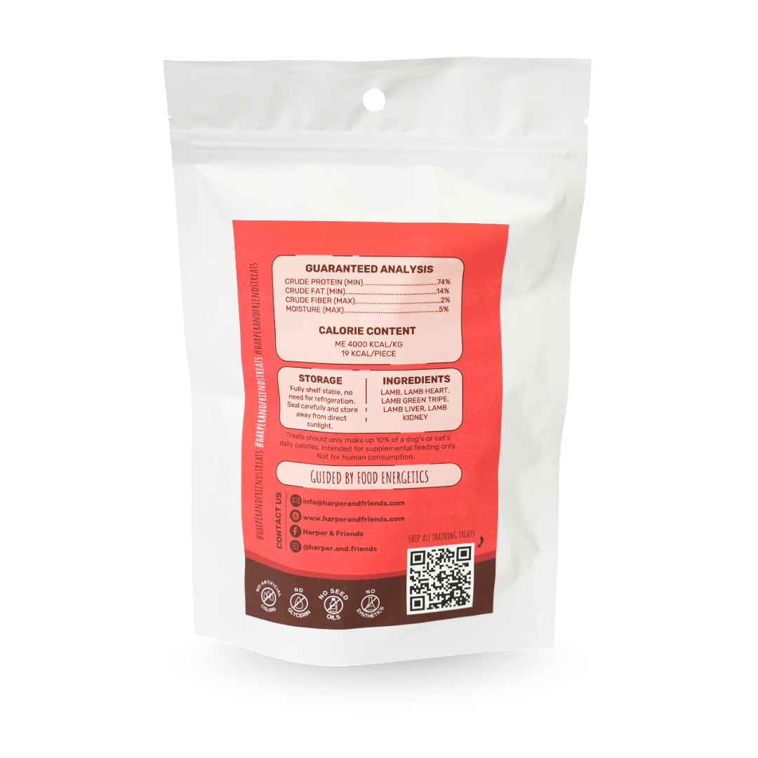 A white stand-up pouch package with a large orange label showing nutritional information, ingredients, and a QR code on a plain white background.